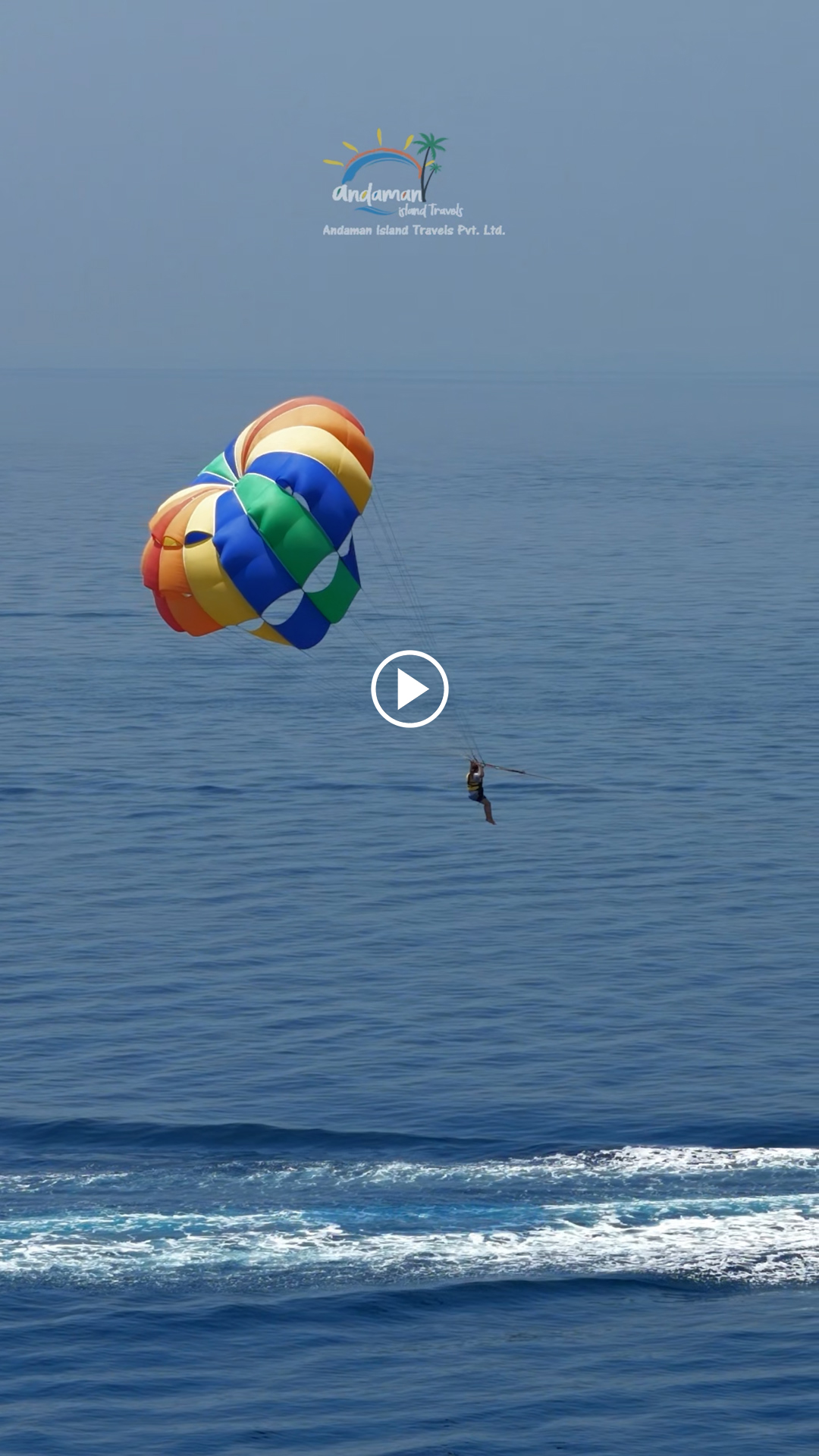 Parasailing over the blue waters of Port Blair